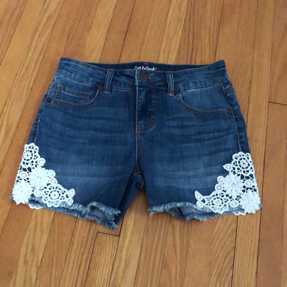 jean shorts with floral pattern on sides